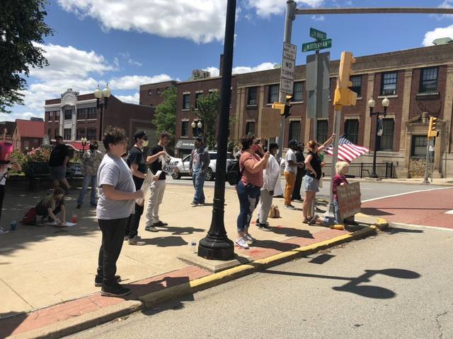 Protesters gather on the corner of North Main and West Otterman streets in Greensburg on Sunday, May 31, 2020.
