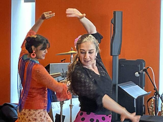 Flamenco Pittsburgh members Abha Bais (from left) and Carolina Loyola-Garcia perform during a Hispanic Heritage Month celebration at The Westmoreland Museum of American Art Sunday .