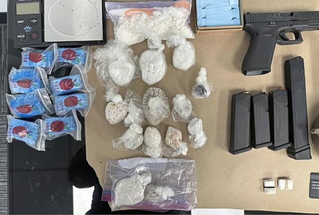 Police seized numerous items during an investigation into a reported drug and gun trafficking ring.